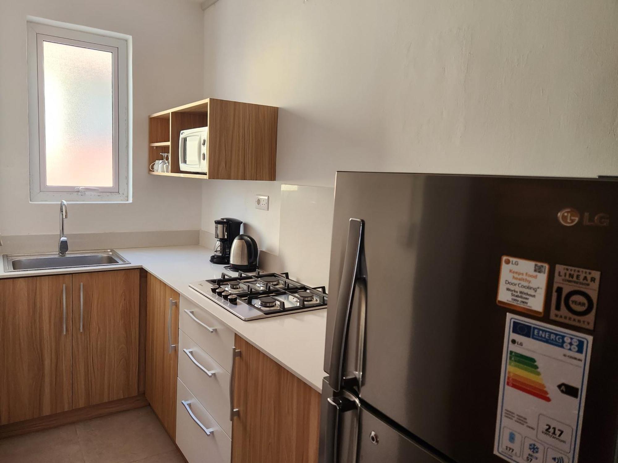 La Perla Holiday Apartments Pereybere Beach Стая снимка